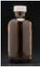 Amber glass boston round bottles